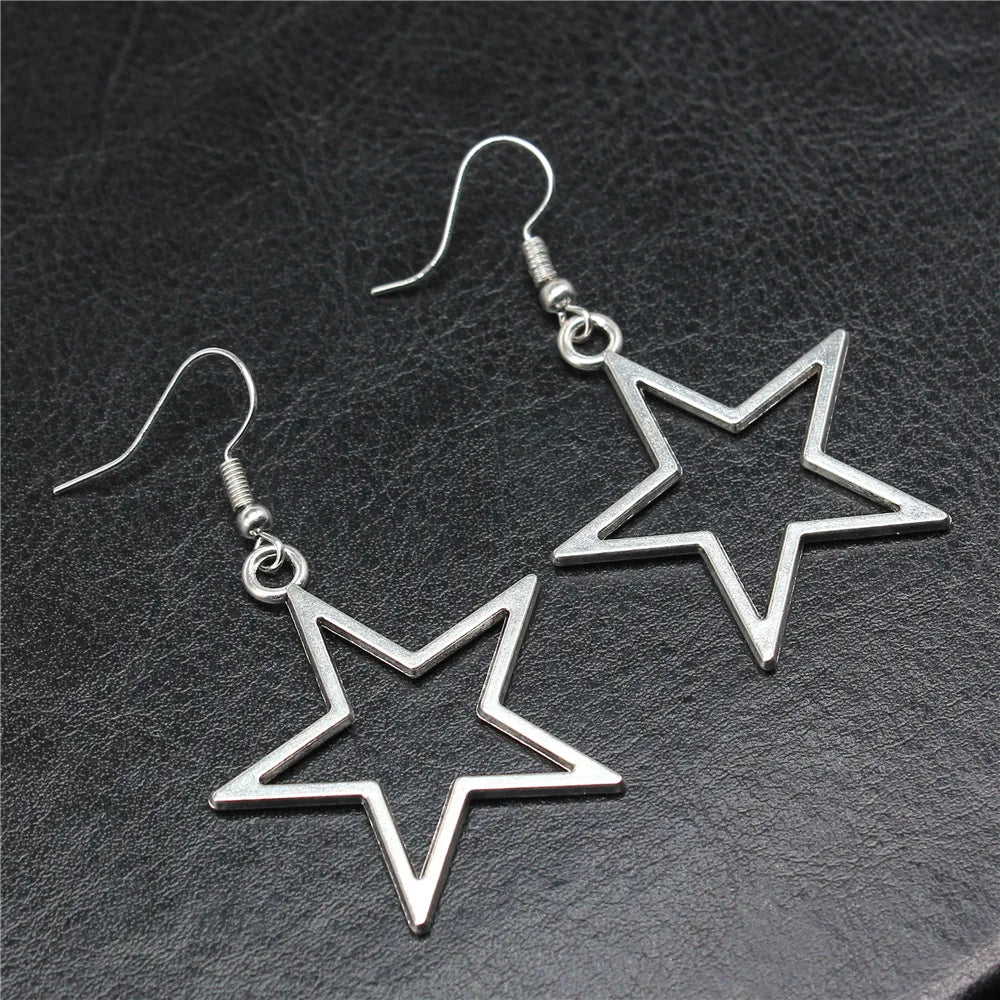 Boucles d'oreilles pendantes antiques étoile creuse au design simple