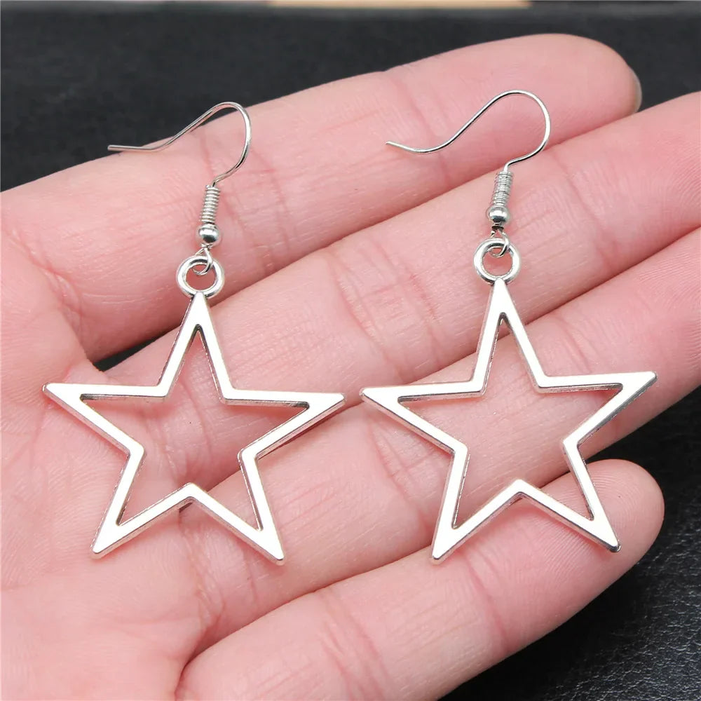 Boucles d'oreilles pendantes antiques étoile creuse au design simple
