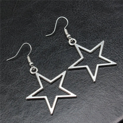 Boucles d'oreilles pendantes antiques étoile creuse au design simple
